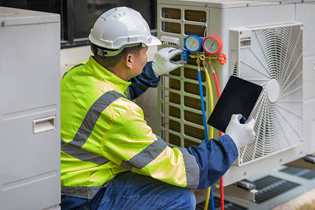 Professional Ductwork Repair technician working in Plainview, NY